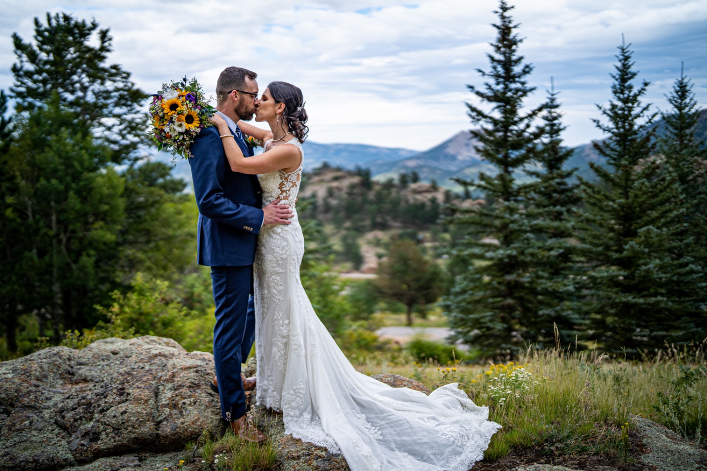 bride and groom portrait at Estes Park, colorado wedding planning, mountain wedding ideas