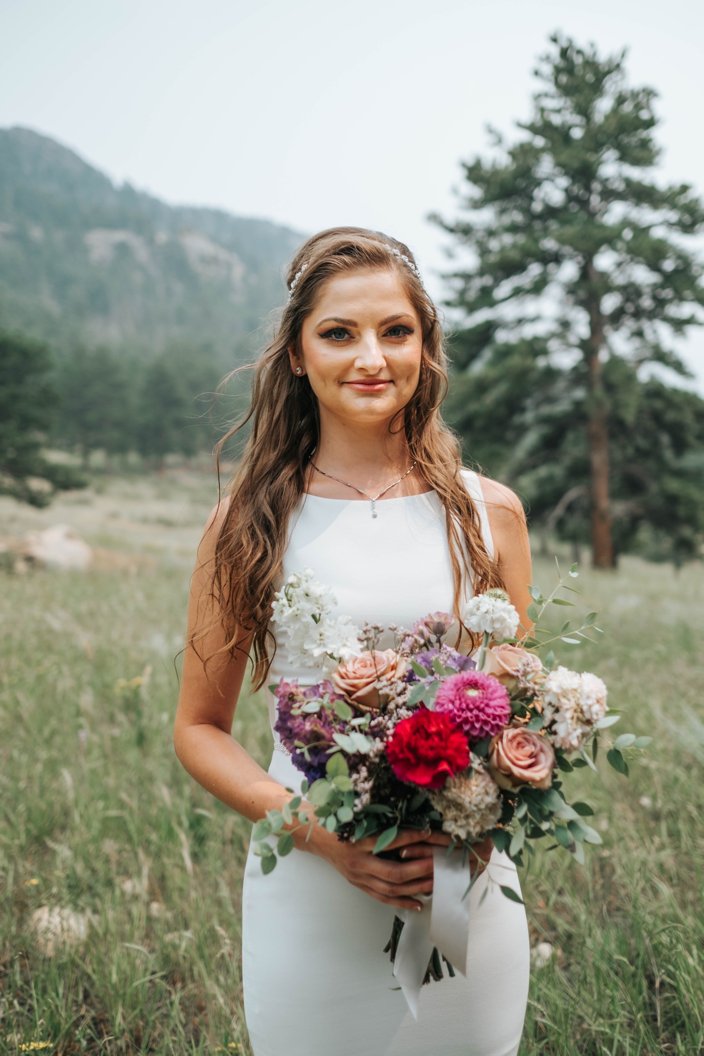 Colorful bridal bouquet for intimate wedding,  intimate wedding in estes park, estes park co wedding